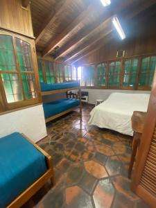 Ένα ή περισσότερα κρεβάτια σε δωμάτιο στο Hostel Casteleyhost