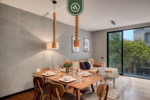 Et opholdsområde på Brand New 2 BR Condo in Roma Norte - Rooftop