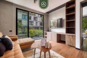 Et opholdsområde på Brand New 2 BR Condo in Roma Norte - Rooftop