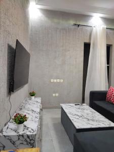 Μια τηλεόραση ή/και κέντρο ψυχαγωγίας στο Le gîte paisible