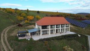 an aerial view of a house with solar panels at Angyal Villa in Rátka