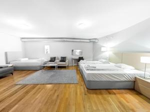 Tempat tidur dalam kamar di Mosebacke Hostel
