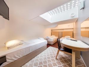 Postel nebo postele na pokoji v ubytování Mosebacke Hostel