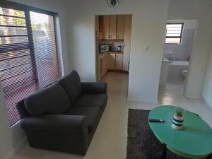 Kuchyň nebo kuchyňský kout v ubytování Greens Golf Course Apartment