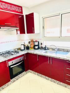 Η κουζίνα ή μικρή κουζίνα στο Cozy & family apartment in Mohammedia