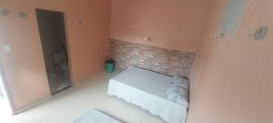 Postel nebo postele na pokoji v ubytování House near the edge of Maçarico