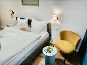 Postel nebo postele na pokoji v ubytování Baltic Riviera Apartments - deluxe with top tarrace river view and fitness gym + 42 fotografií