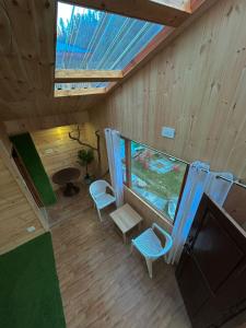 Posezení v ubytování Alpine Stays Riverside