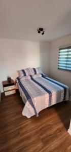 Ένα ή περισσότερα κρεβάτια σε δωμάτιο στο La casita de San Pedro