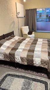 Ένα ή περισσότερα κρεβάτια σε δωμάτιο στο Newly Renovated Studio with Private Entrance