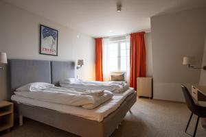 Ένα ή περισσότερα κρεβάτια σε δωμάτιο στο Tott studios