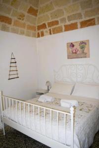 Postel nebo postele na pokoji v ubytování Casa ALMA