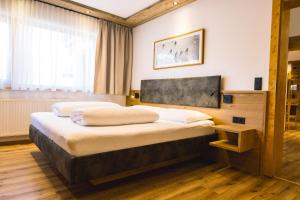 Voodi või voodid majutusasutuse Hotel Bergkranz toas