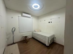 Ένα ή περισσότερα κρεβάτια σε δωμάτιο στο Casa em gravata com 4 quartos