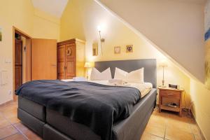 Ένα ή περισσότερα κρεβάτια σε δωμάτιο στο Wellness-Residenz Wohnung 18