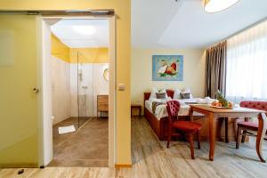 Un lugar para sentarse en VULKAN Residenz Hotel I Self Check-in