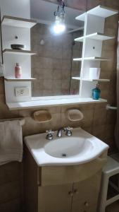 Et badeværelse på Centro con Vista al lago