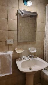 Et badeværelse på Centro con Vista al lago