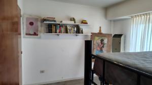 Biblioteket i lejligheden + 3 billeder