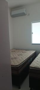 a bedroom with a bed and a window at Casa Sol in Prado