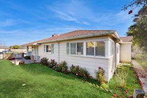 a small house with a yard at West End Wanderlust in Eureka