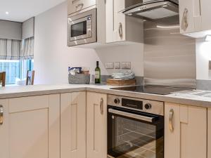 Kuchyň nebo kuchyňský kout v ubytování Pride Of Erin - Uk45929