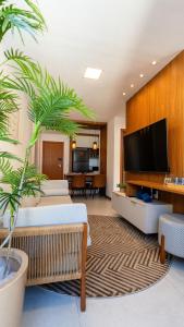 Et tv og/eller underholdning på Novíssimo! Na 2ª quadra do mar!