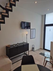 Μια τηλεόραση ή/και κέντρο ψυχαγωγίας στο Huis ALNA 10