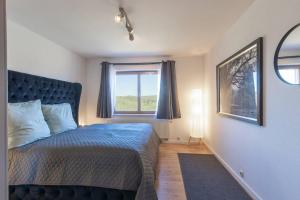 Postel nebo postele na pokoji v ubytování Living between heaven and forest