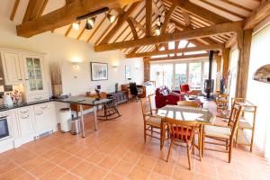 Kuchyň nebo kuchyňský kout v ubytování Nature's Lodge