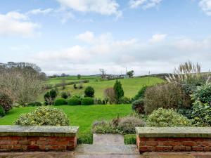 a view of the garden from the house at Old Upper Gwestydd in Highgate