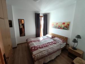 Ένα ή περισσότερα κρεβάτια σε δωμάτιο στο Cevedale-Valdisole