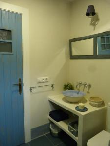a bathroom with a sink and a mirror at Casa de Tintas in Cuenca +64 photos