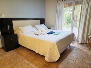 Postel nebo postele na pokoji v ubytování Casa Relax Liniers Chacras de Coria + 37 fotografií