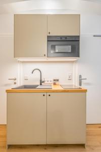 Kuchyň nebo kuchyňský kout v ubytování Air Con I free parking I floor heating