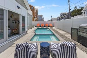 Φωτογραφία από το άλμπουμ του 5BR Pool Hot Tub Cabana Elevator and Game Room σε Brigantine