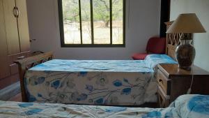 Postel nebo postele na pokoji v ubytování Habitación doble SOLO PARA DAMAS + 4 fotografie