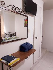 Μια τηλεόραση ή/και κέντρο ψυχαγωγίας στο Hotel 8 leguas