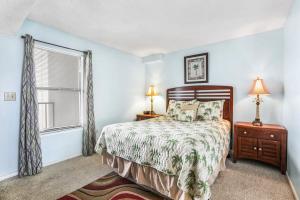 Postel nebo postele na pokoji v ubytování Island Wind West 177 Next to Hangout pool + 14 fotografií