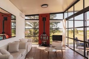 TV a/nebo společenská místnost v ubytování La Casa de Cristal by Puerto Dijama