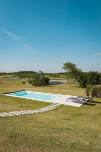 Bazén v ubytování La Casa de Cristal by Puerto Dijama nebo v jeho okolí + 107 fotografií