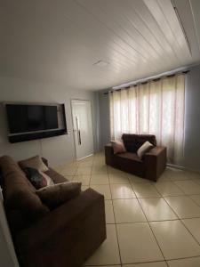 Телевизор и/или развлекательный центр в Casa Descanso Cataratas