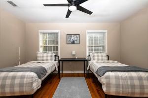 Ένα ή περισσότερα κρεβάτια σε δωμάτιο στο Cozy 4BR Family Home Near Texas Tech Campus