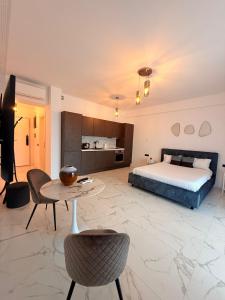 En eller flere senge i et værelse på Holidays Sea Vibes One + 57 billeder