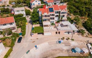 an aerial view of a city with houses at Cozy Apartment In Sreser With Wifi in Sreser