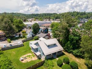 an aerial view of a house with a yard at Stella Maris in Blowing Rock