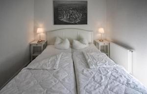 En eller flere senge i et værelse på K73 Eg