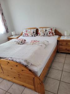 Postel nebo postele na pokoji v ubytování Ferienwohnung Neumeyer