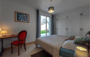 Giường trong phòng chung tại Belle Villa Vue Mer