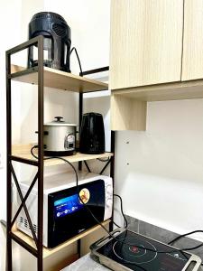 Kuchyň nebo kuchyňský kout v ubytování Paradise Point Staycation